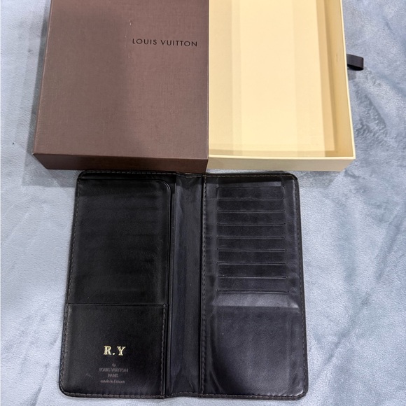 Louis Vuitton wallet in flawless condition. Has initials RY on inside. - Picture 2 of 3